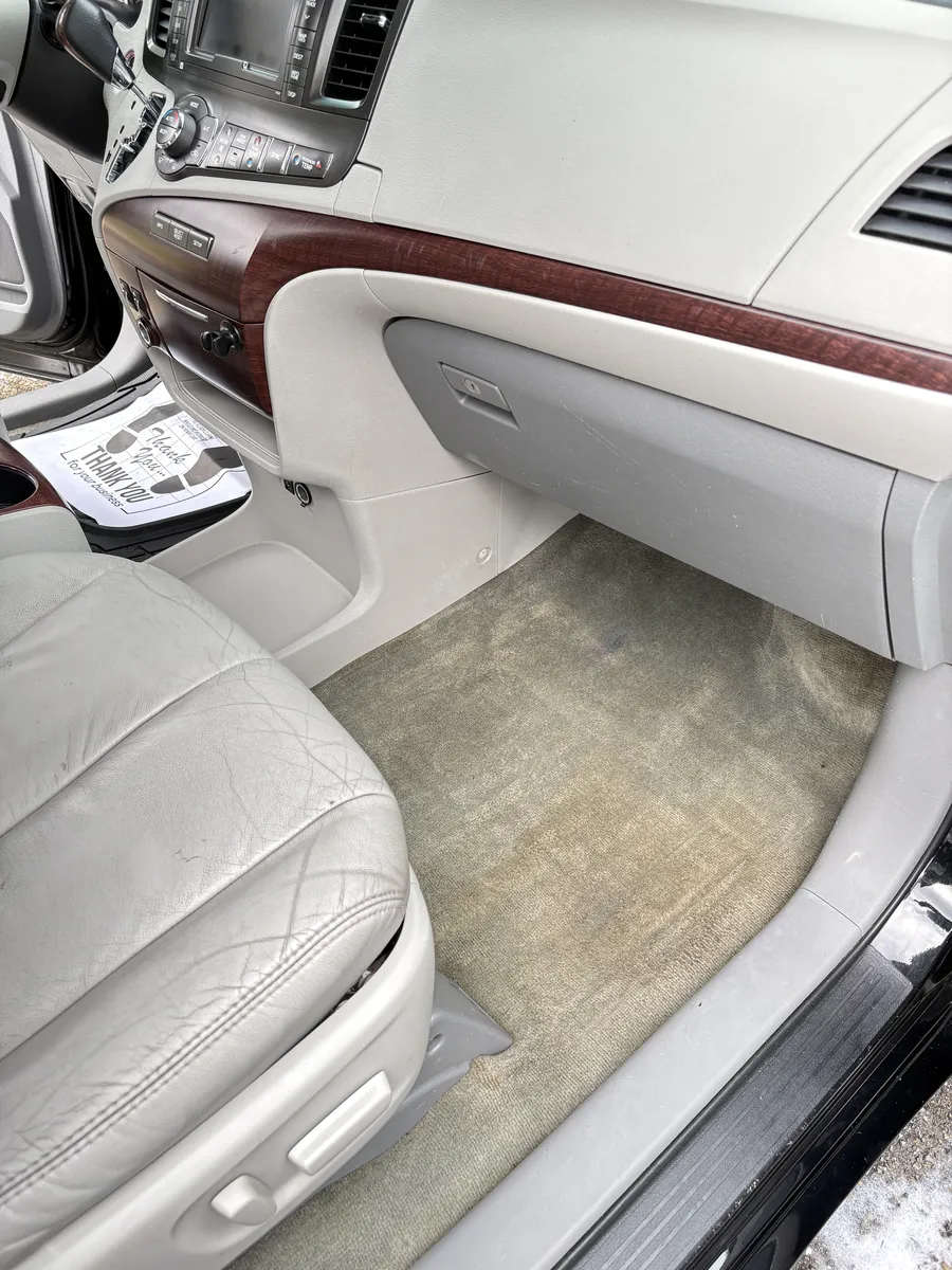Same Toyota Sienna front carpet after the detail