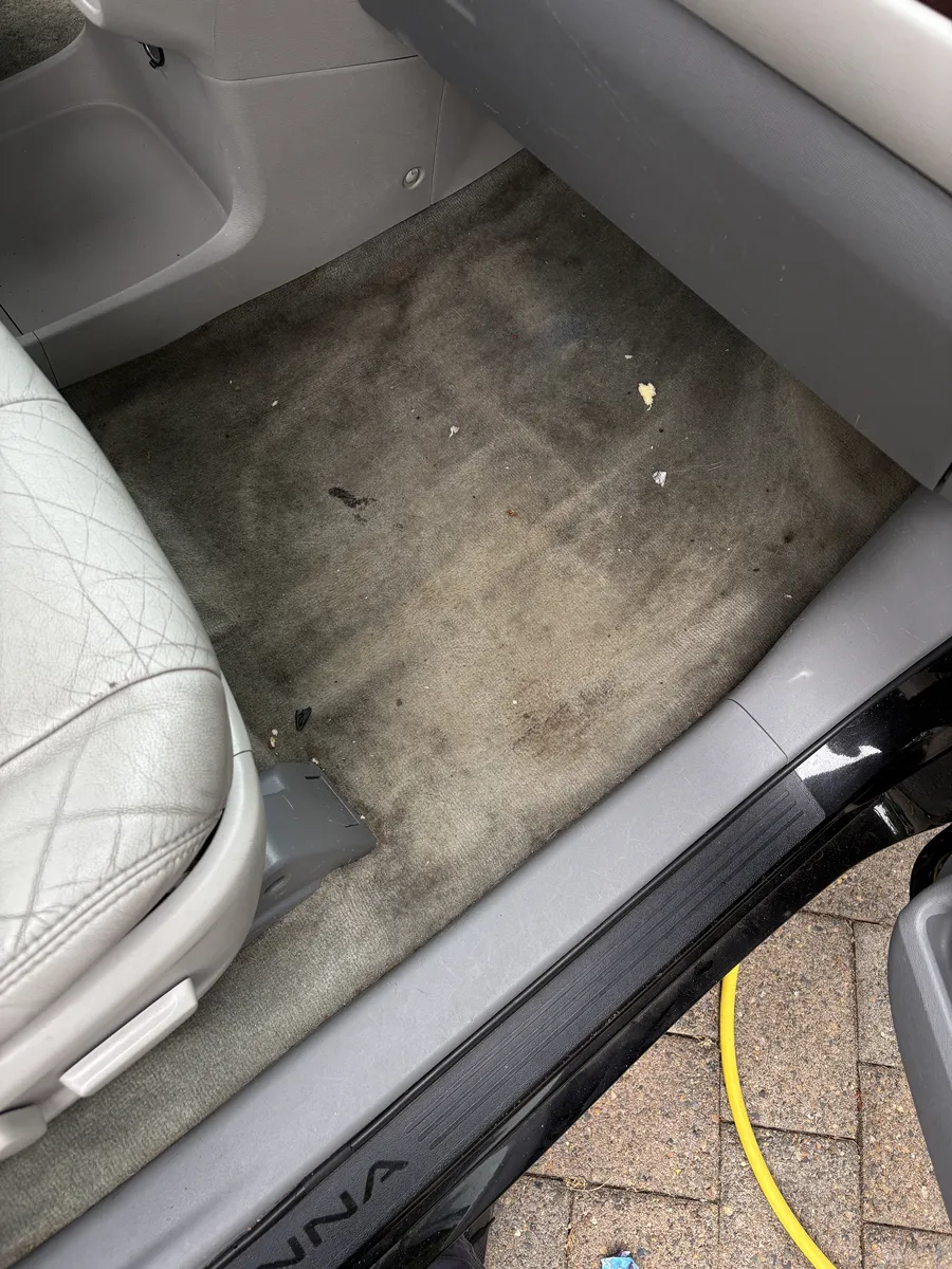 Toyota Sienna front carpet before, stained and dirty
