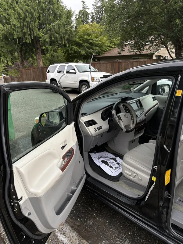 Toyota Sienna front seats and door after a detail
