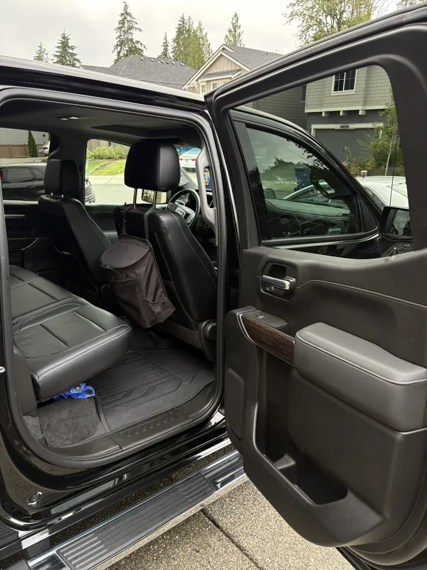Clean rear seats of a black GMC Sierra after an interior detail
